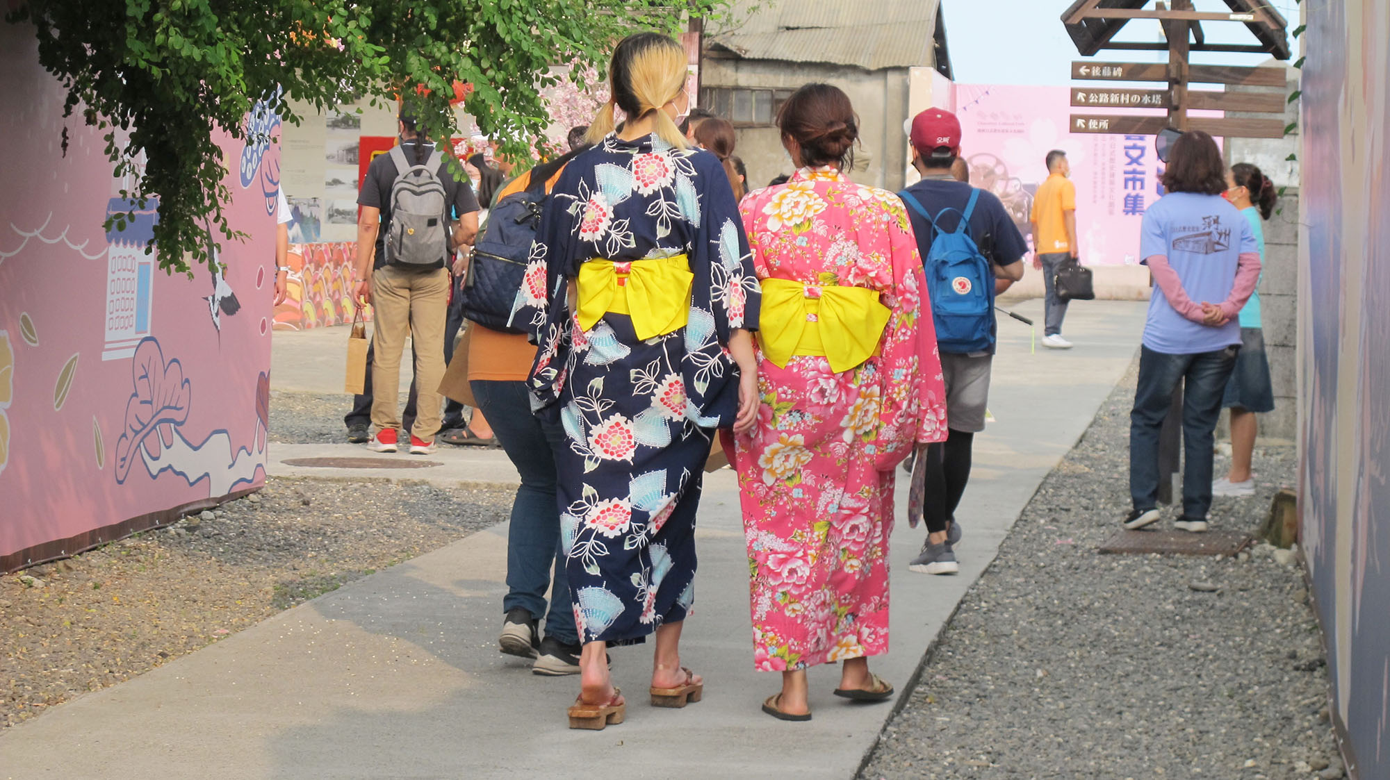 Two girls, clad in kimonos