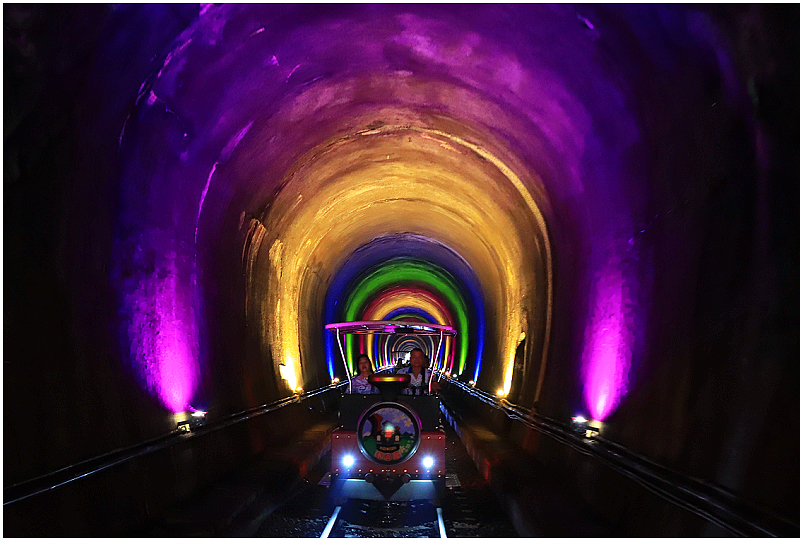 The colorful tunnels resemble a surreal realm
