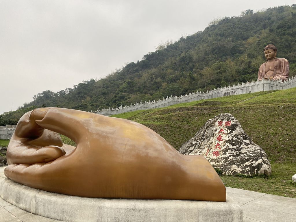 the gigantic Buddha hand